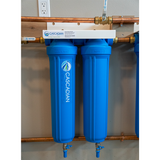 ICS-STP WATER TREATMENT SYSTEM WITH POLYHALT LOCATED IN CUSTOMERS GARAGE